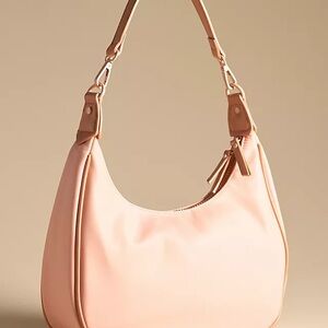Anthropology orange (peach) Round Shoulder and crossbody bag.